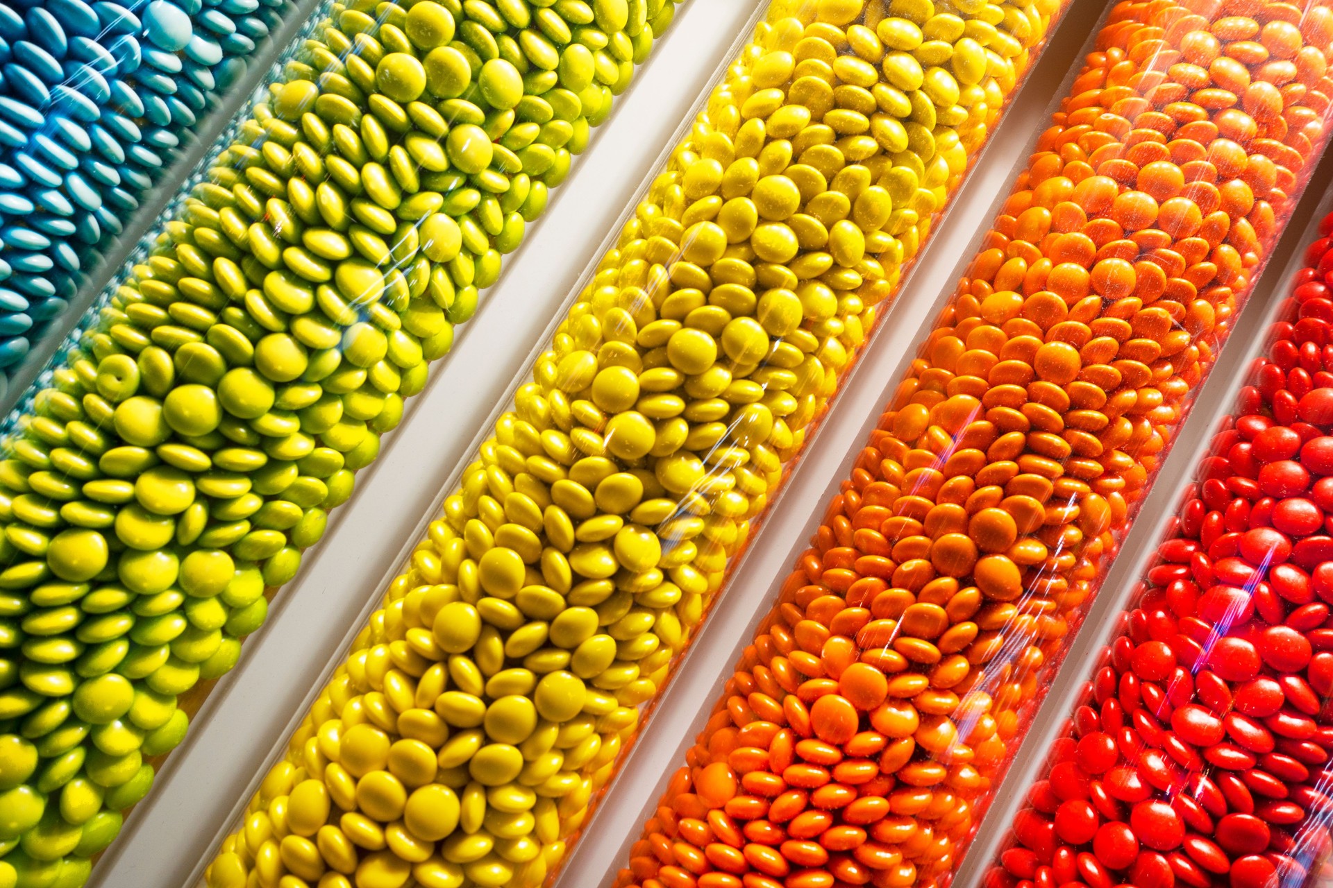 Assortment of multicolored candies,Wall decoration with chocolate candies.